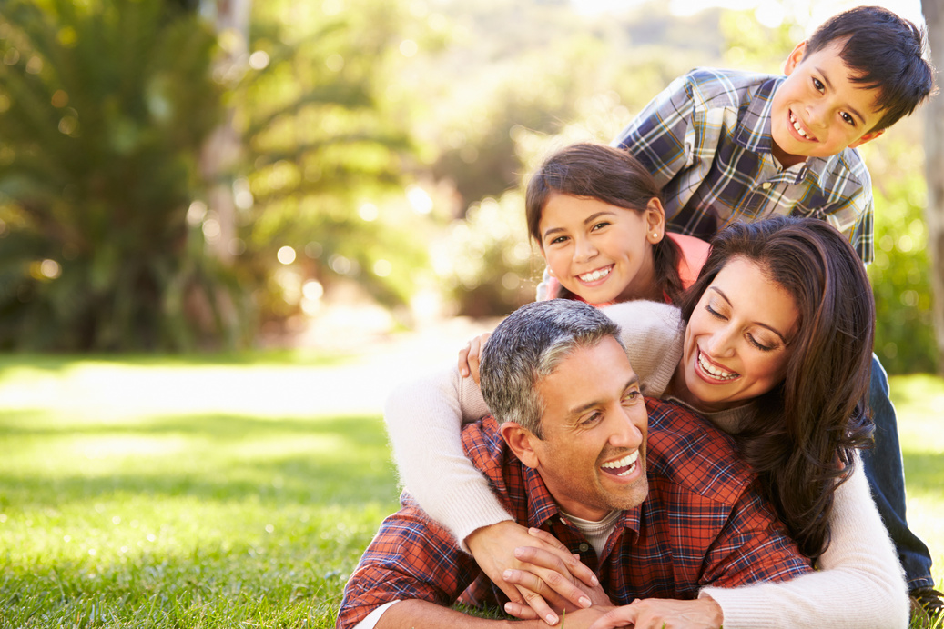 Family Lying on Grass