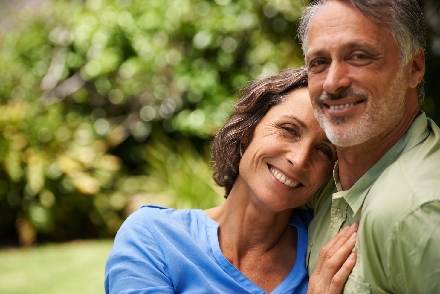 Happy, middle-aged couple embracing